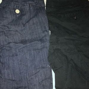 Two pairs of Bermuda shorts. One Denim one black.